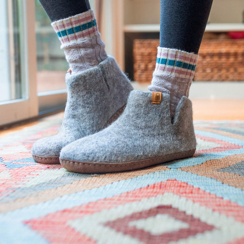 Baabushka felted wool is gentle on your feet —naturally insulating, yet allowing your skin to breathe— so you can enjoy wearing your Baabushka slippers year-round